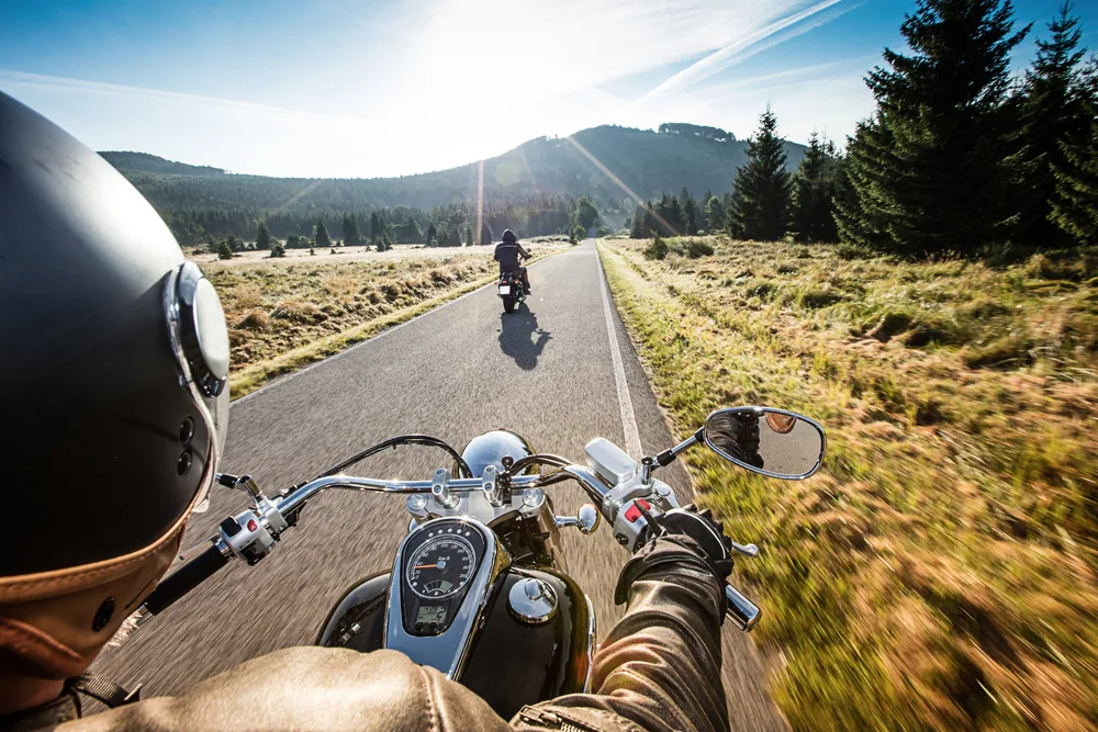 Photo of man driving an motorcycle